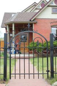 Metal, iron front entry, arch top gate, 4-foot tall fence