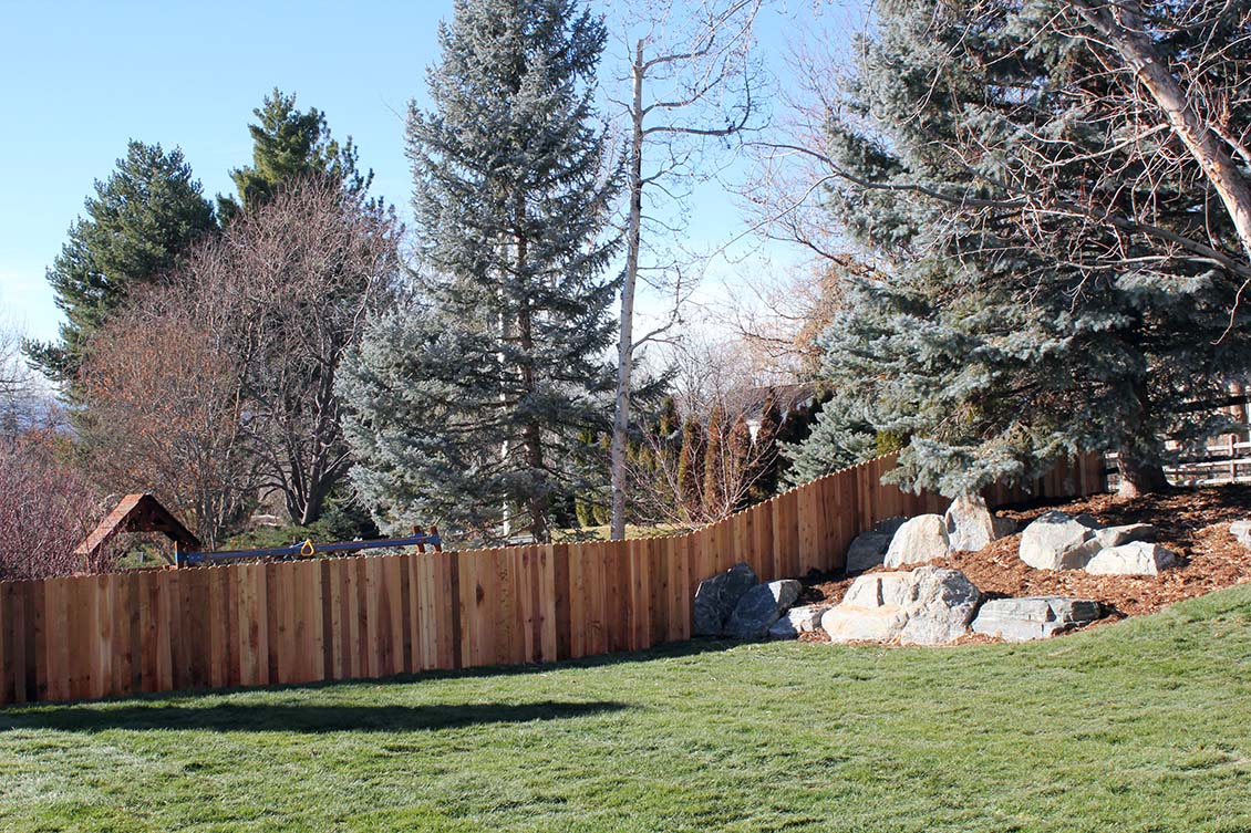 Vertical slate privacy fence