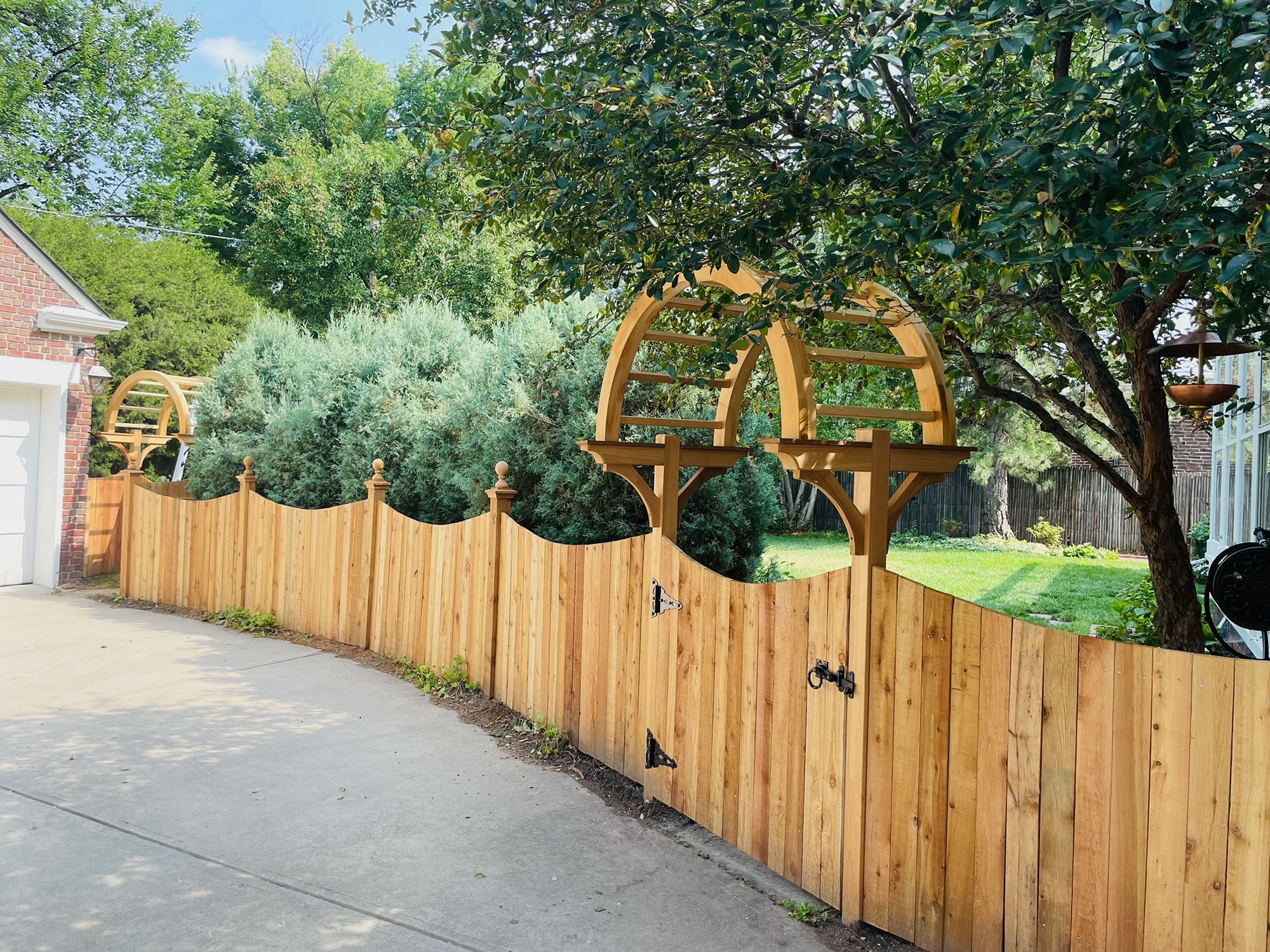 wood arbor over gate